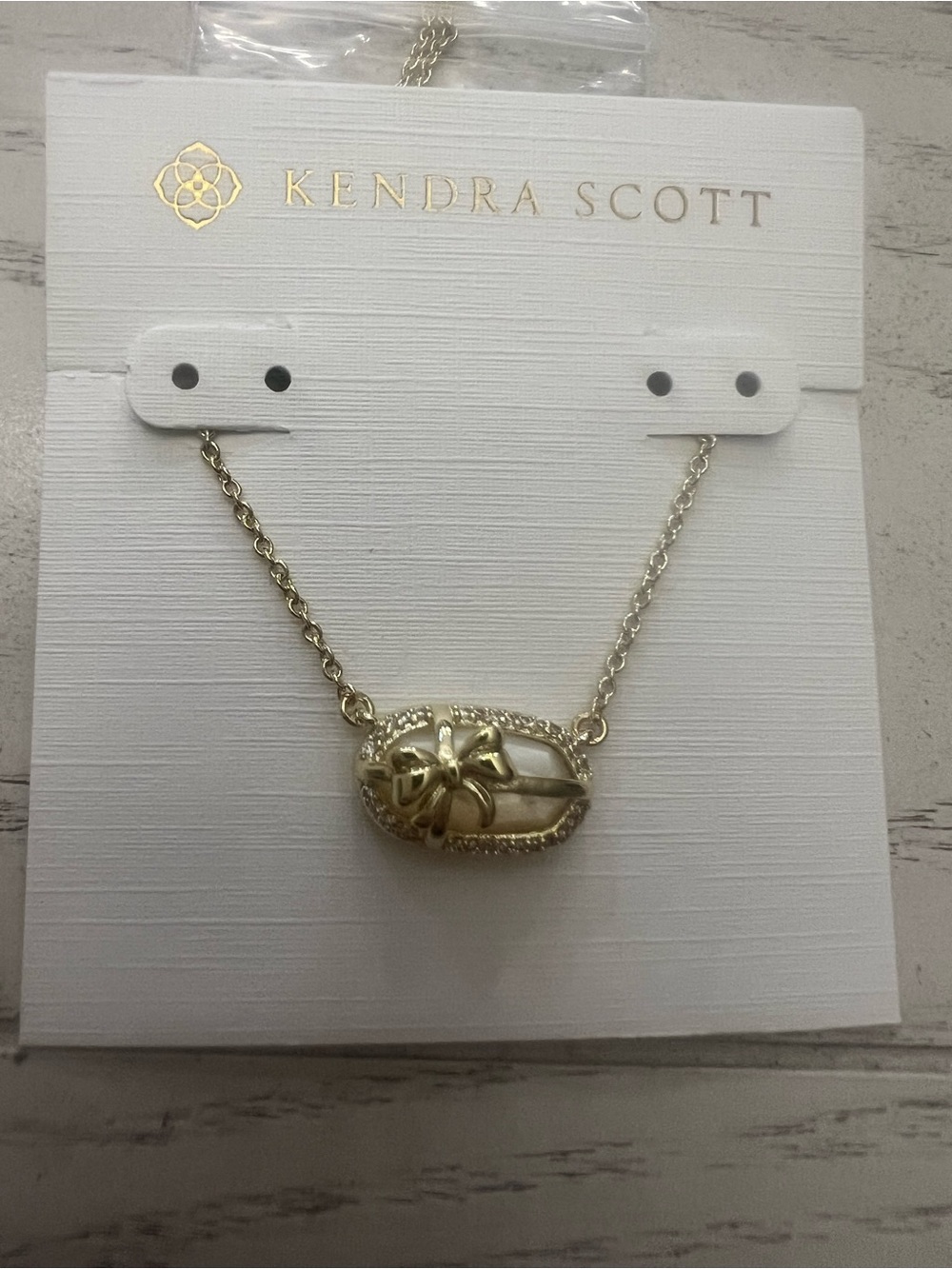Kendra Scott Gold Tone Mother of Pearl with Bow Accent Necklace NWT
